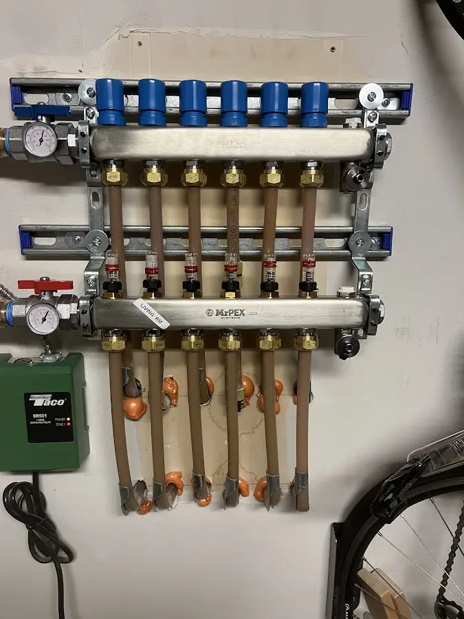 Plumber performing Gas Leak Detection at a residential property in Delafield